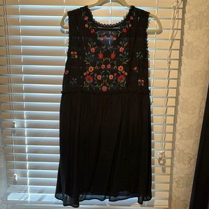 Black and floral print Umgee summer dress. 34 inches long baggy feel. Worn twice